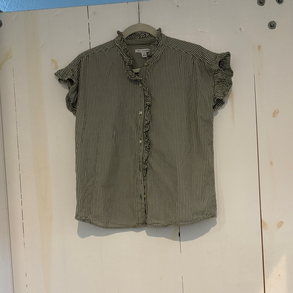 Striped Free Assembly ruffle neck and sleeve button-down shirt.